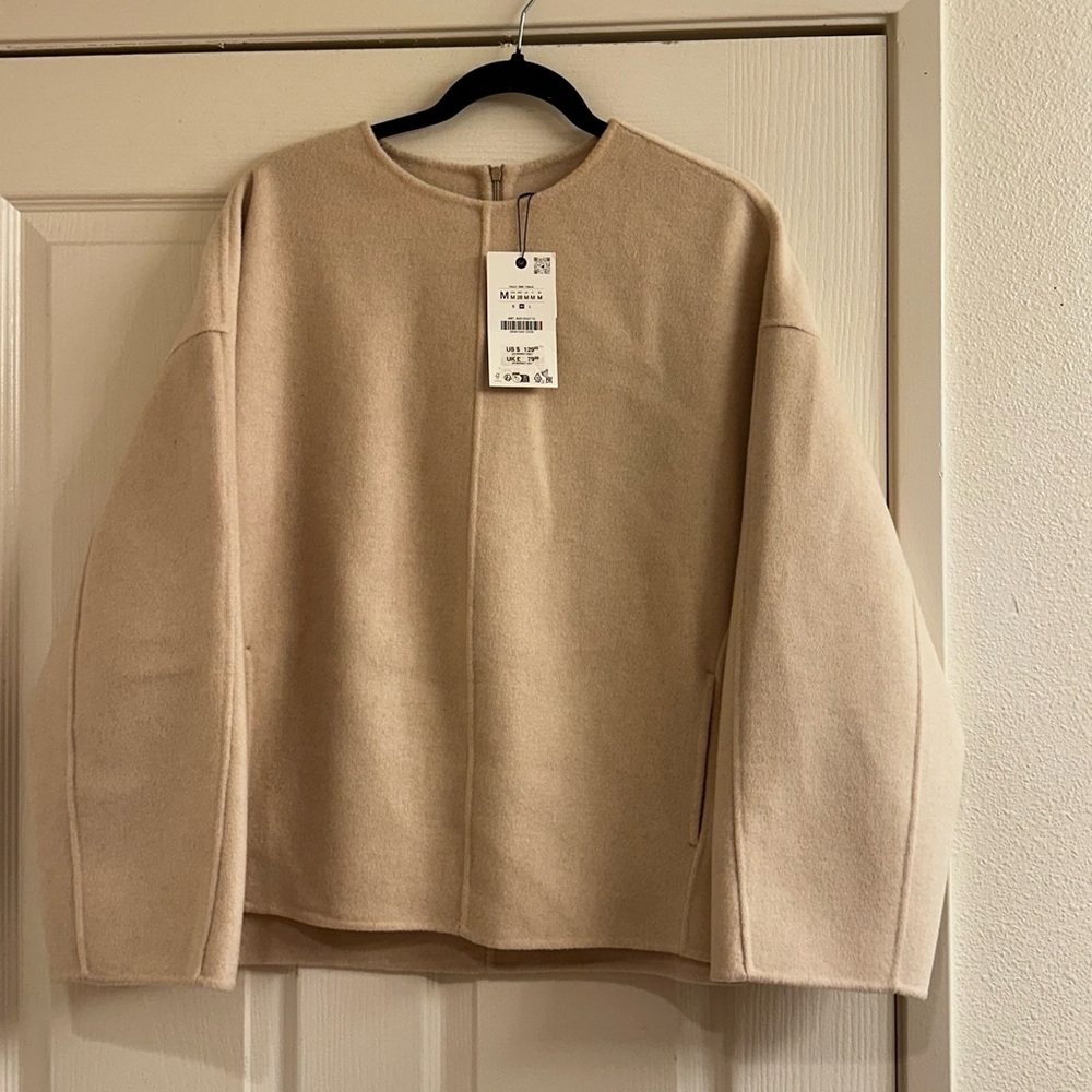 Beige women's wool Sweater